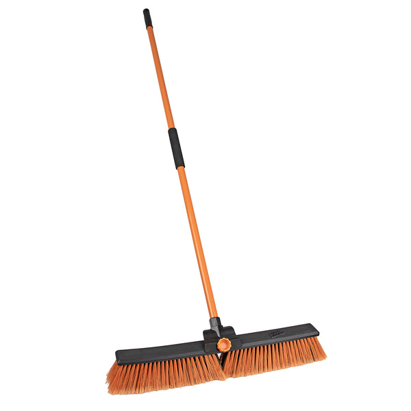 Orange industrial broom with black handle and bristles for commercial cleaning