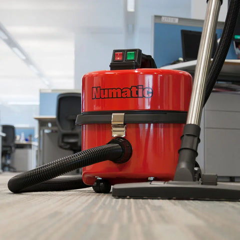 Front view of the Numatic NQS250B Commercial Vacuum Cleaner in the office environment 