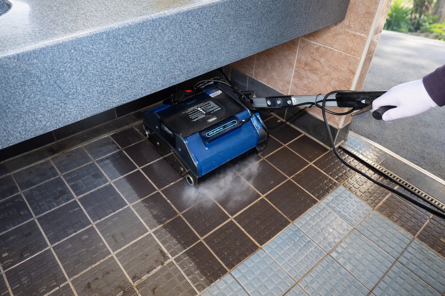 Duplex 420 steam cleaner deep cleaning tiled floor surfaces in commercial environments