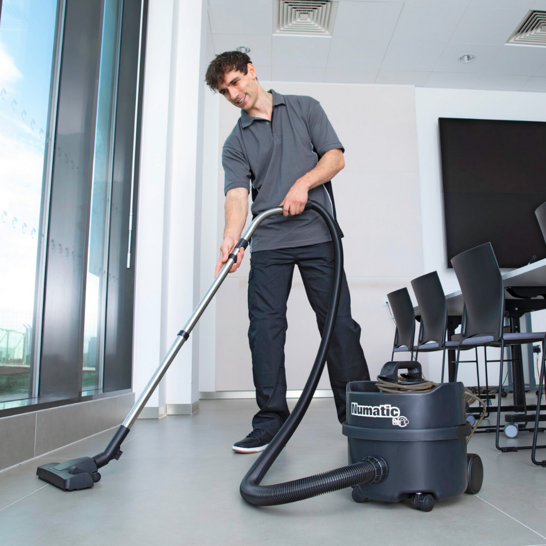 Henry Hoover Black 8L in use for cleaning commercial office flooring