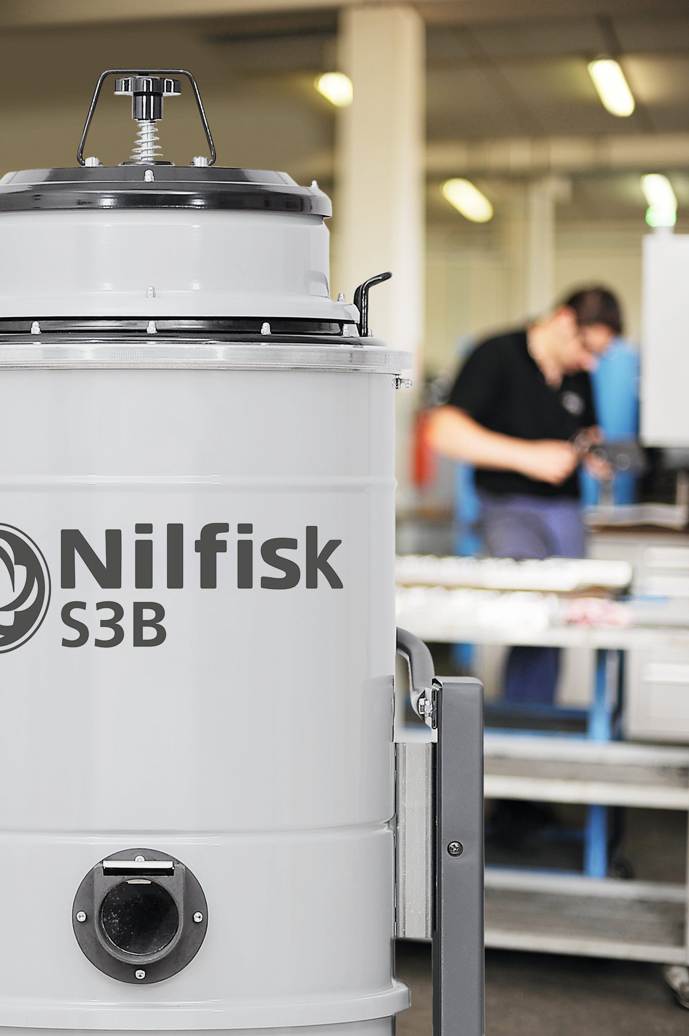 Front view of the Nilfisk S3B L100 showing inlet port and stainless steel drum