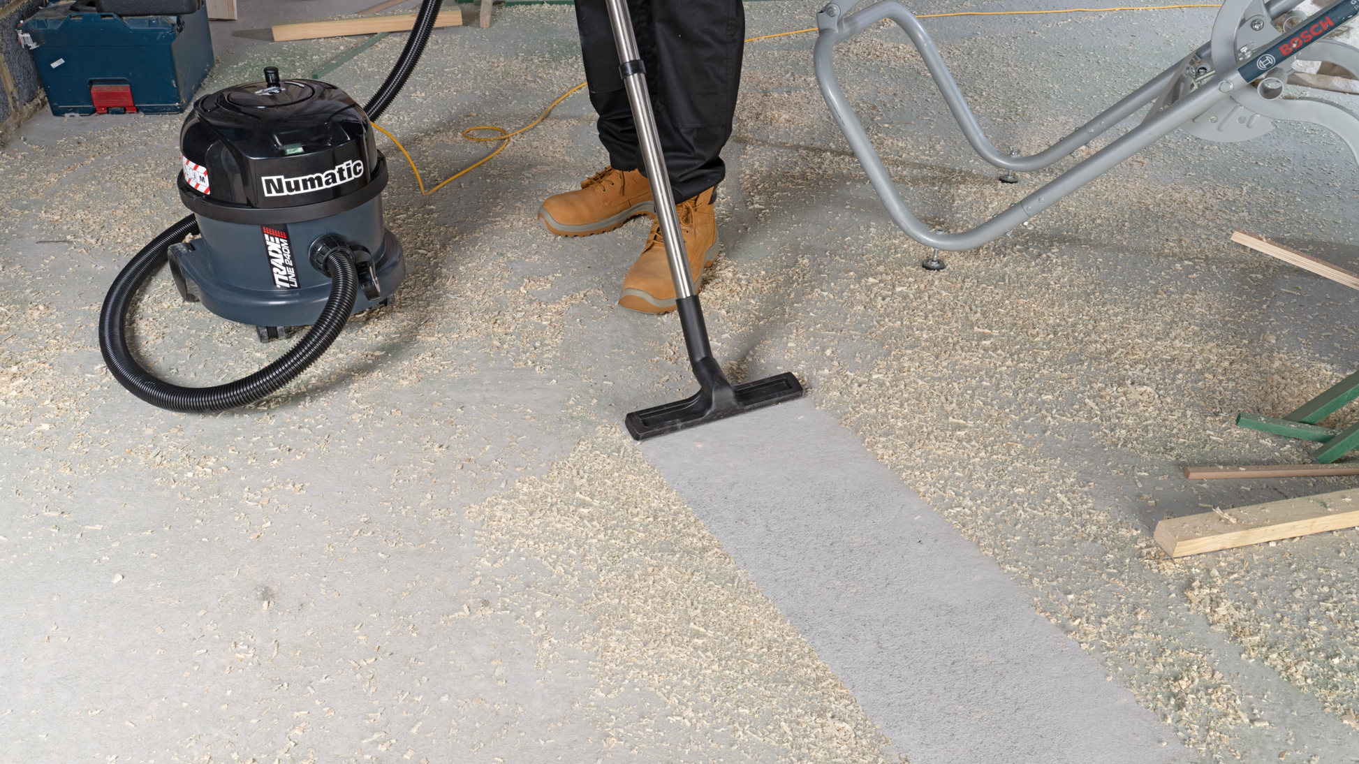 Numatic TRM240 M-Class extractor being used on a construction site to remove fine dust