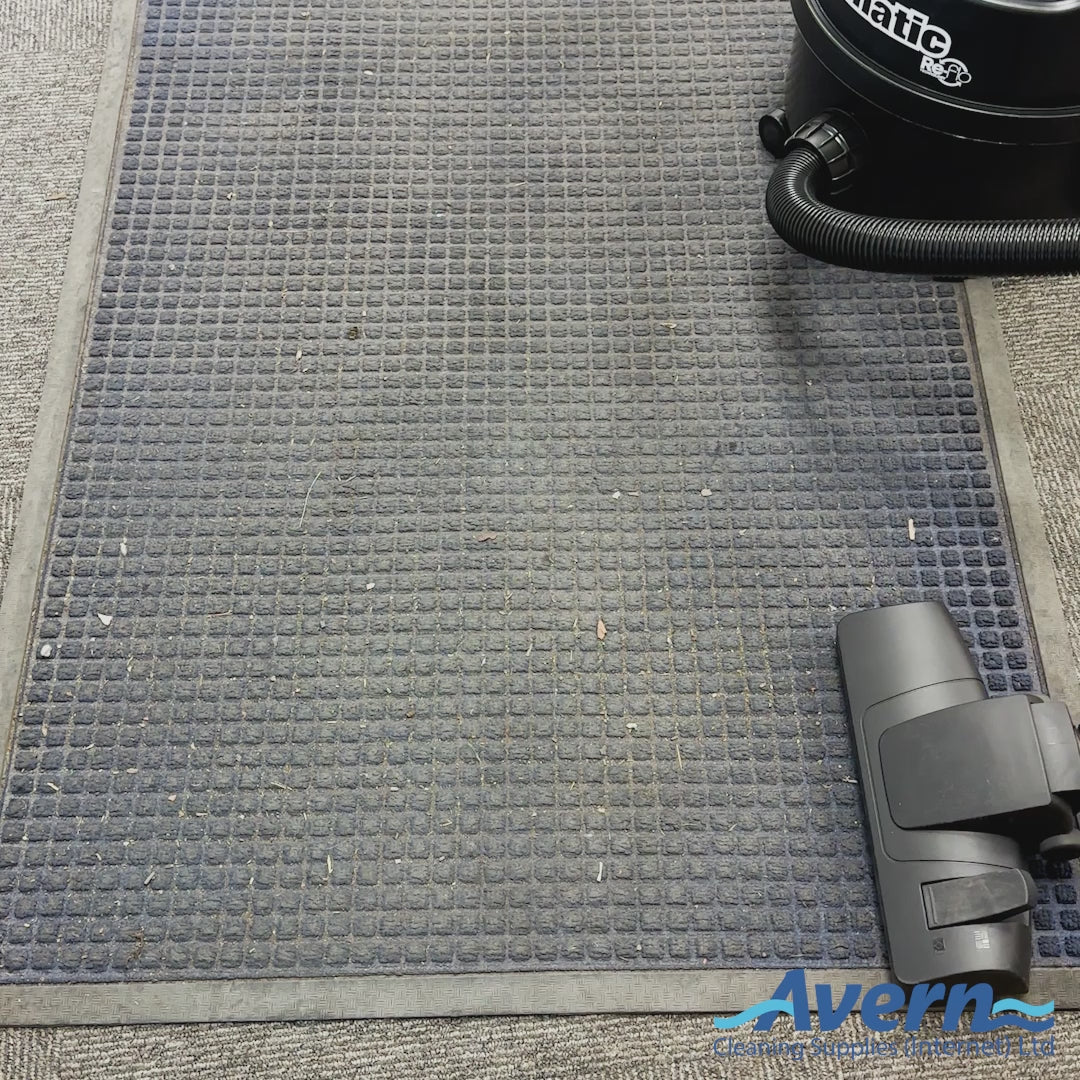 Load video: Demonstration of Henry Hoover Black 8L vacuum cleaning commercial flooring