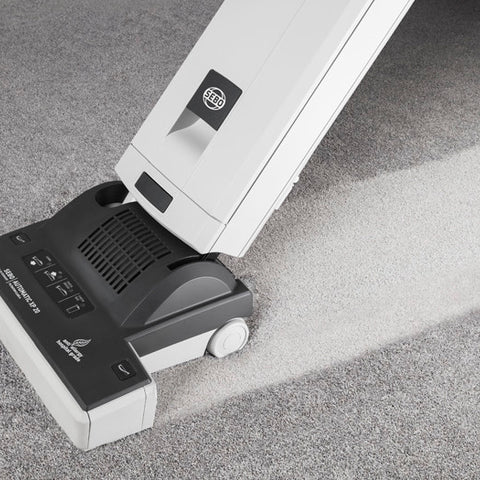 Image of the SEBO XP10 Upright Commercial Vacuum Cleaner being used on the carpet