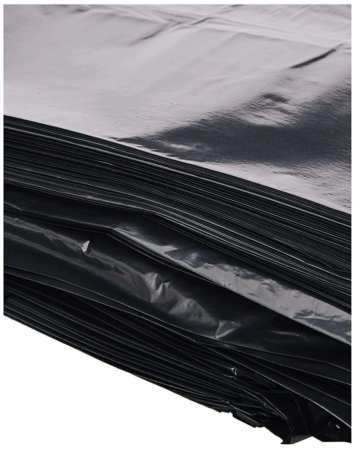 Close-up of stacked black bin liners showing extra-thick 280 gauge material