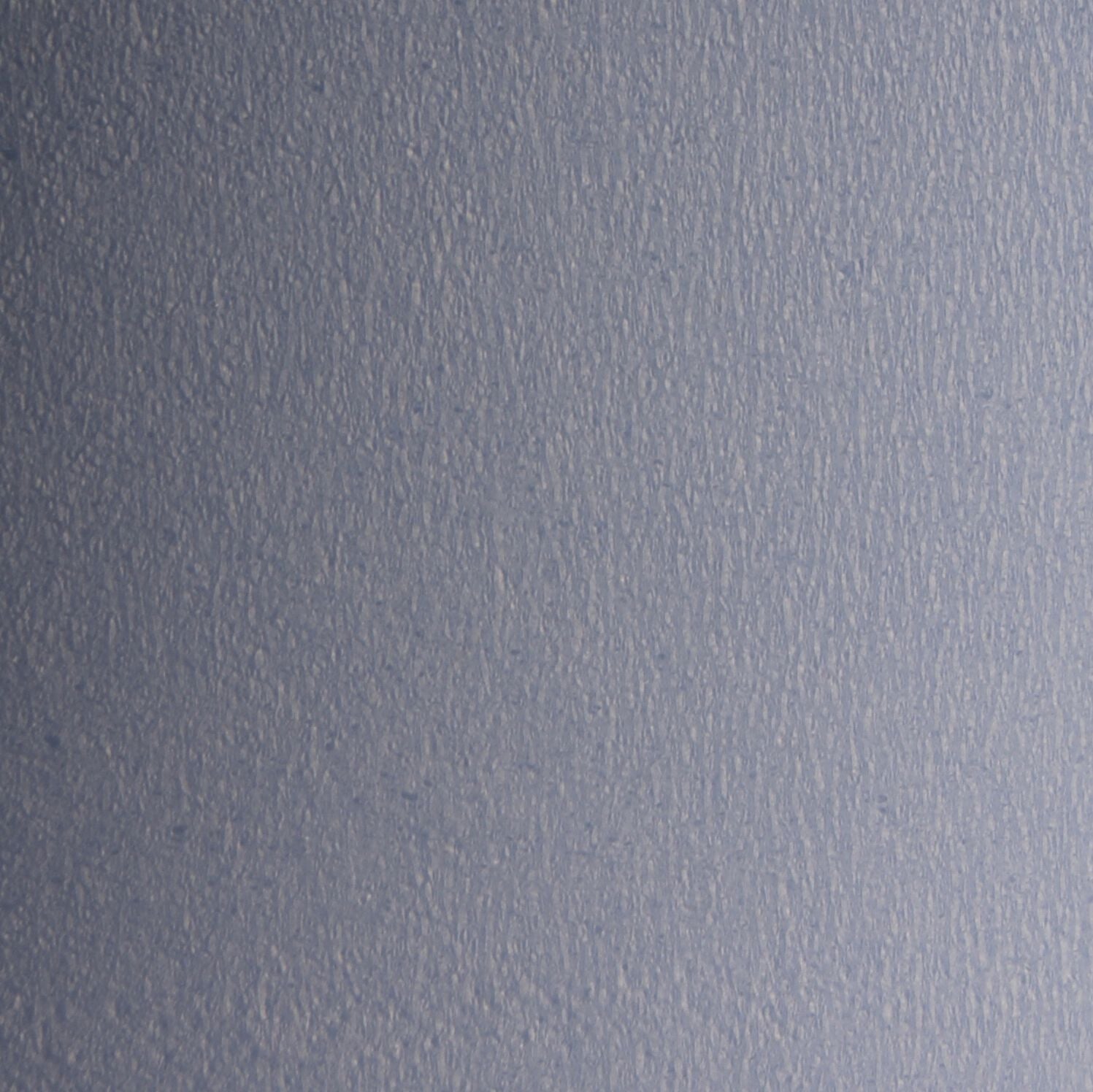 Close-up texture image showing embossed 2-ply blue roll paper material