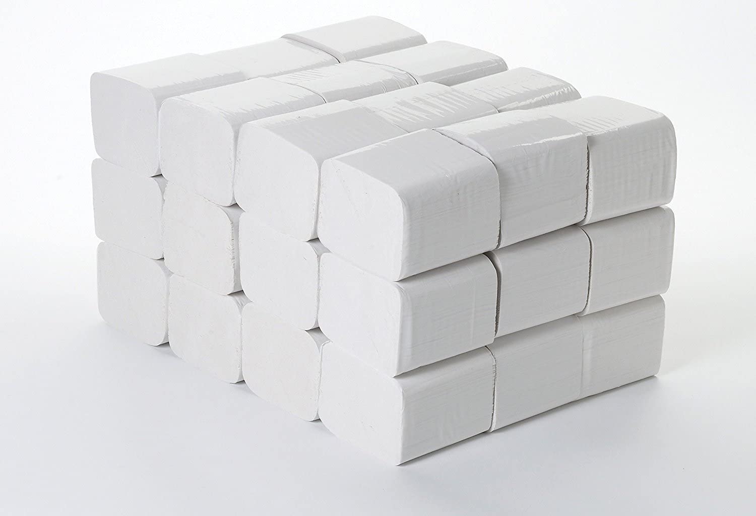 Stacked inner packs of bulk toilet tissue paper showing high-volume supply
