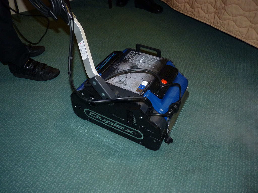 Duplex 420 steam cleaner in use on carpeted flooring for deep hygienic steam cleaning