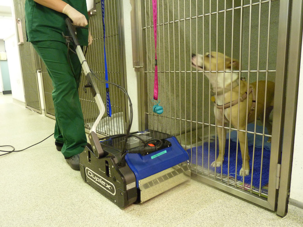 Industrial Duplex 420 steam cleaner scrubbing hard floors in heavy-duty cleaning application