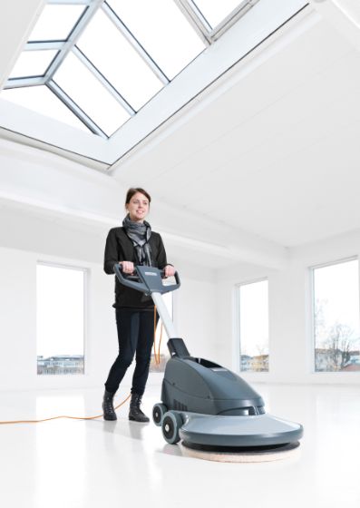 Nilfisk BU500 ultra high speed burnisher being used for commercial floor polishing