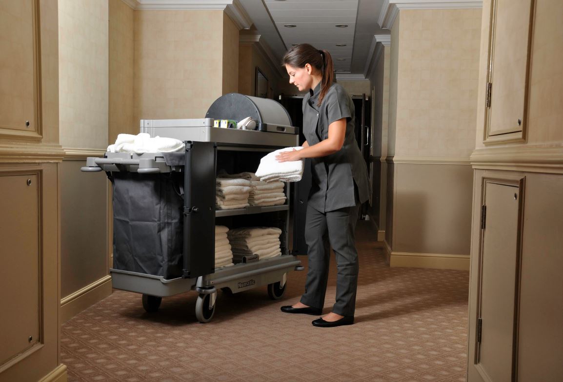 Numatic NuKeeper Twin NKU32RHF housekeeping trolley in use for hotel room service and linen handling