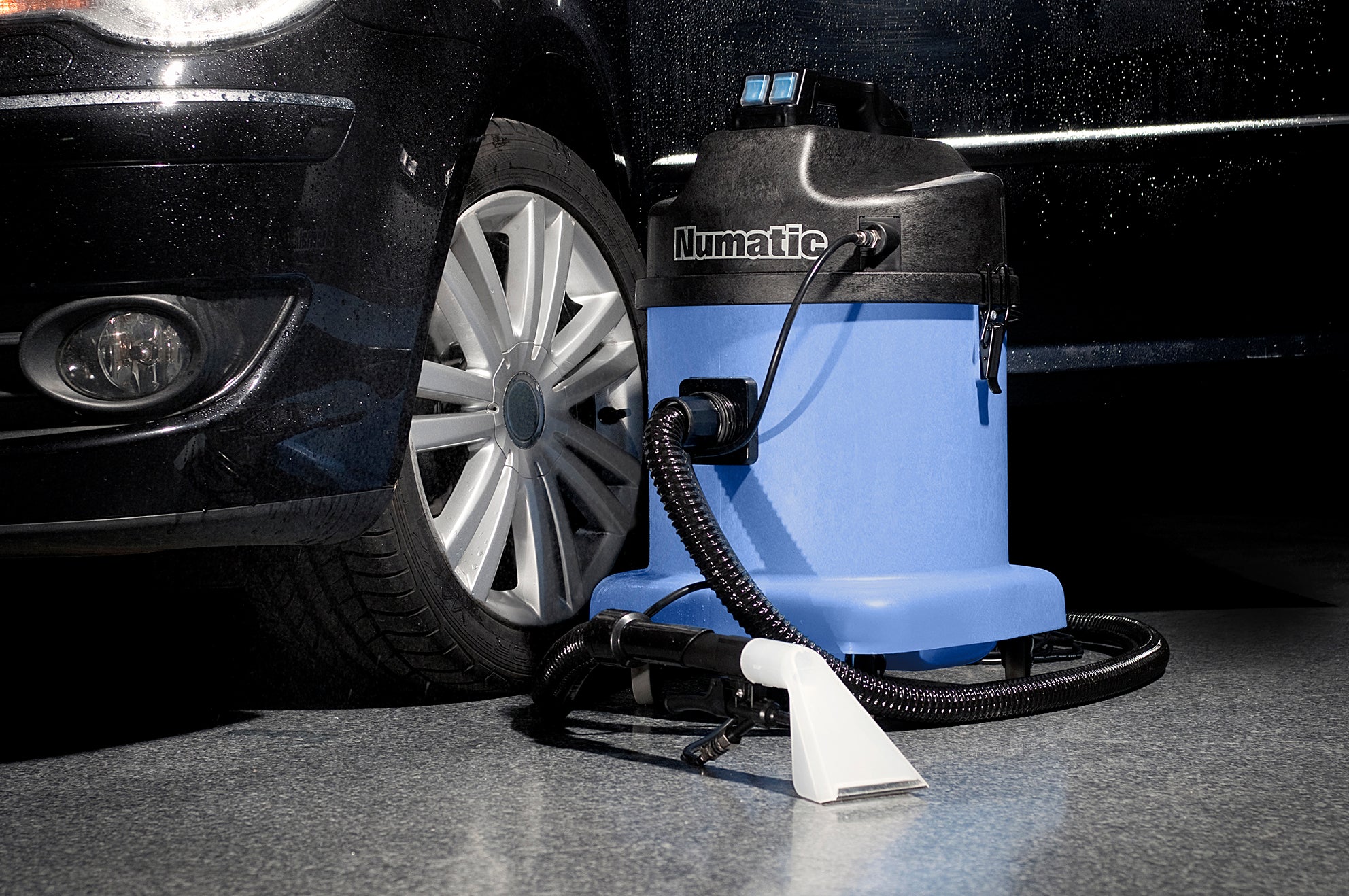 Numatic CT570 upholstery extraction machine being used for vehicle or commercial cleaning