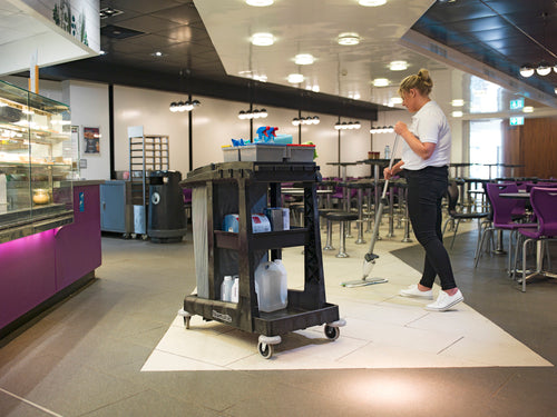 Numatic EM1 ECO-Matic housekeeping trolley in use within commercial indoor environment
