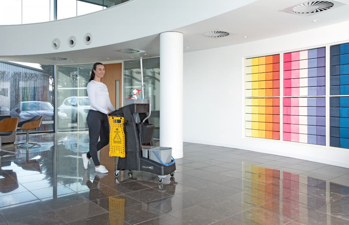Numatic Multi-Matic MM4 cleaning trolley positioned in a modern commercial interior