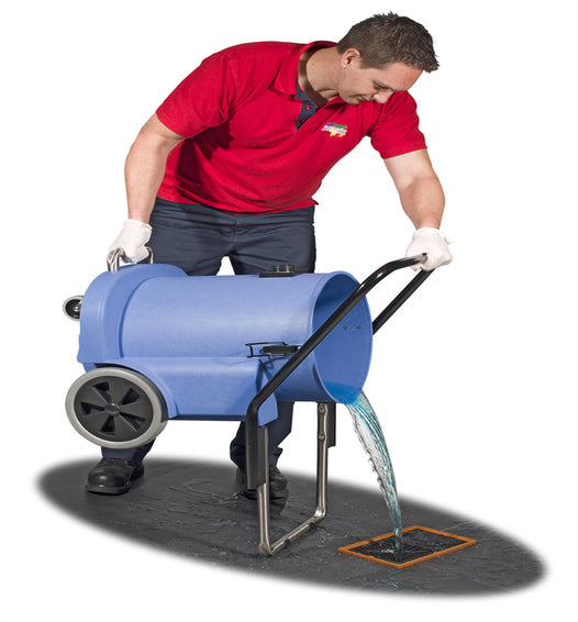 Operator demonstrating tilt-to-empty system on the Numatic WV900-2 wet and dry vacuum
