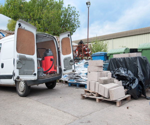 Numatic NVDQ900-2 industrial vacuum being used for construction and site cleanup