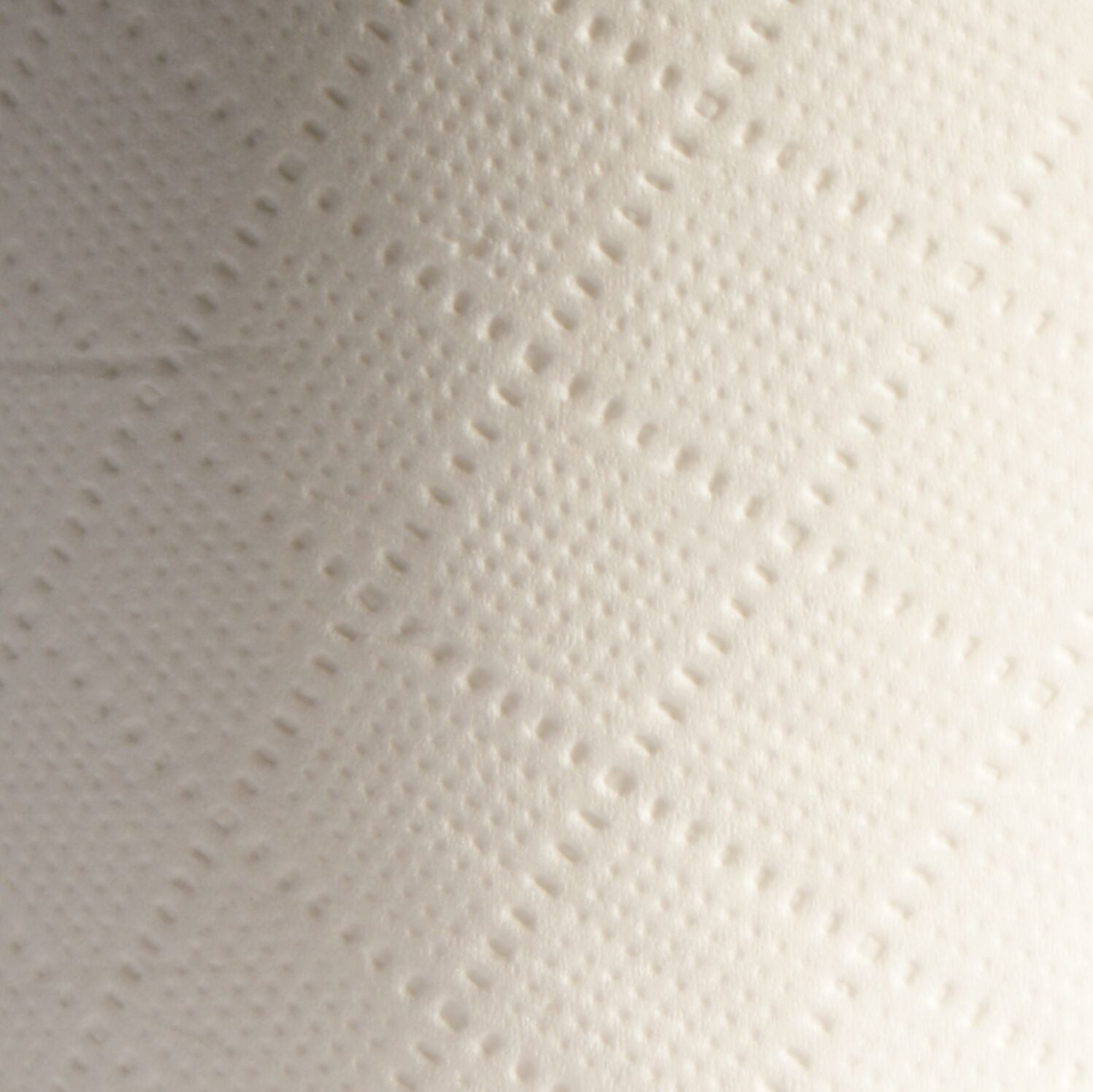 Close-up of Whisper quilted 3 ply toilet paper texture for softness and strength
